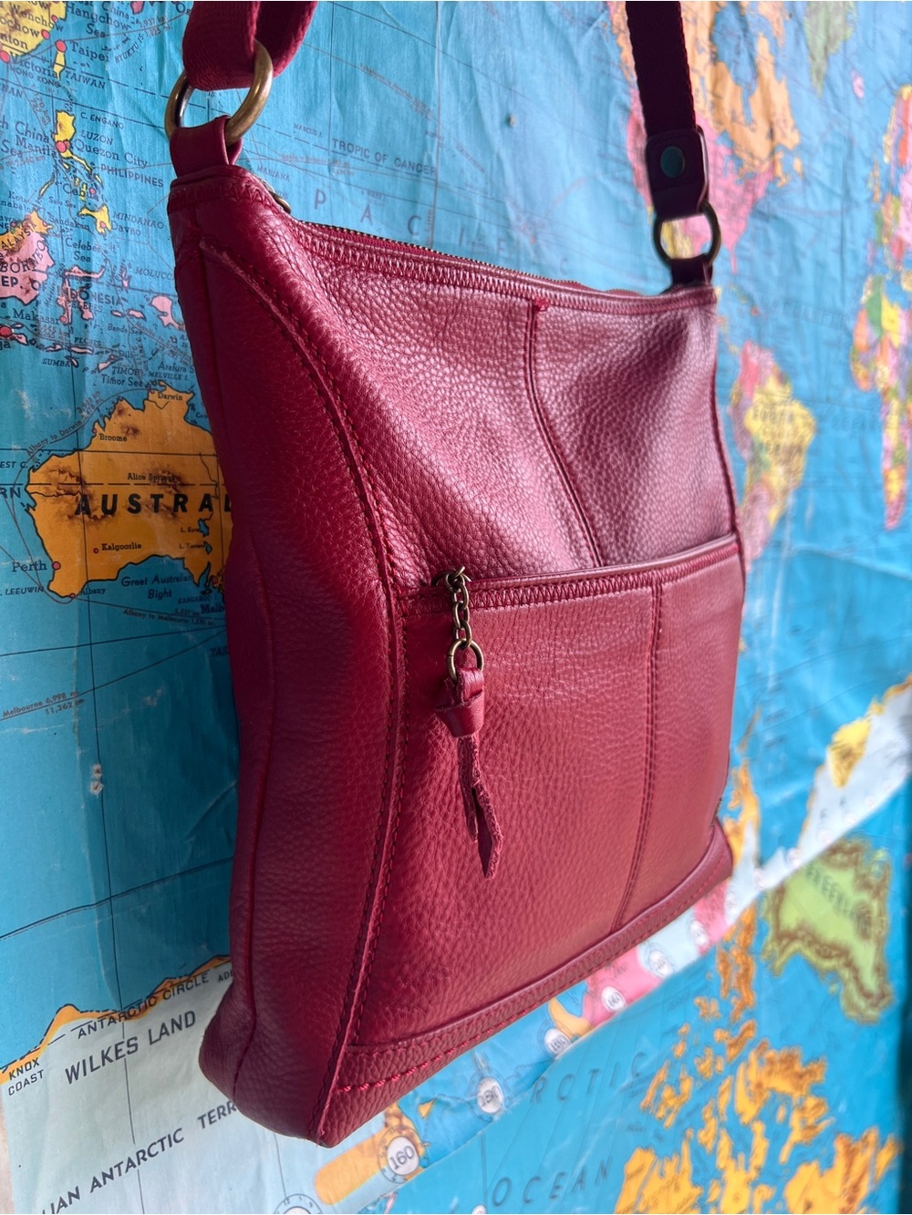 The Sak Pebbled Leather Crossbody in Berry